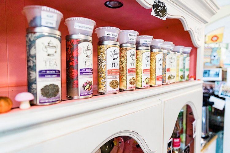 a line of tea products on a shelf captures for the businesses product portfolio by Eugene photographer