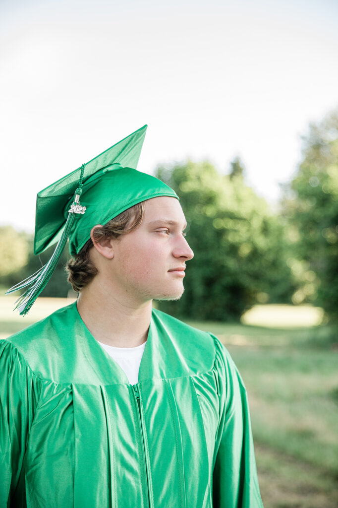 scholarship Eugene high school Sheldon graduate graduation green cap and gown